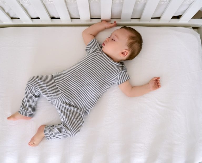 baby sleeping in crib