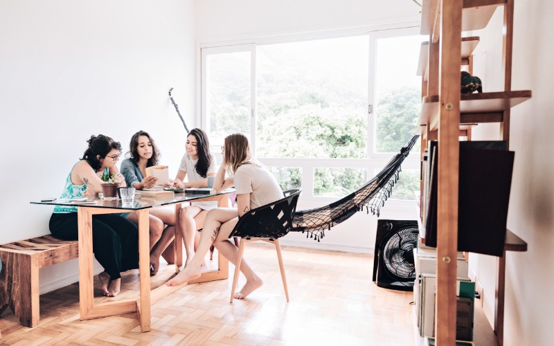 roommates sitting around table