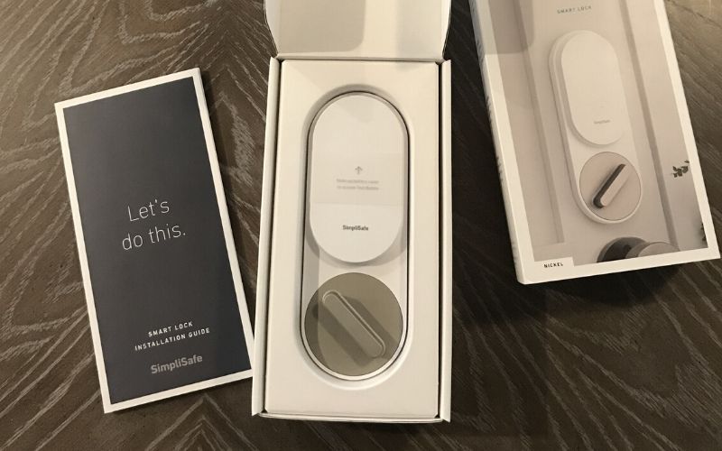 SimpliSafe smart lock in the box with instructions