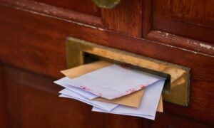 letters in a door mail slot