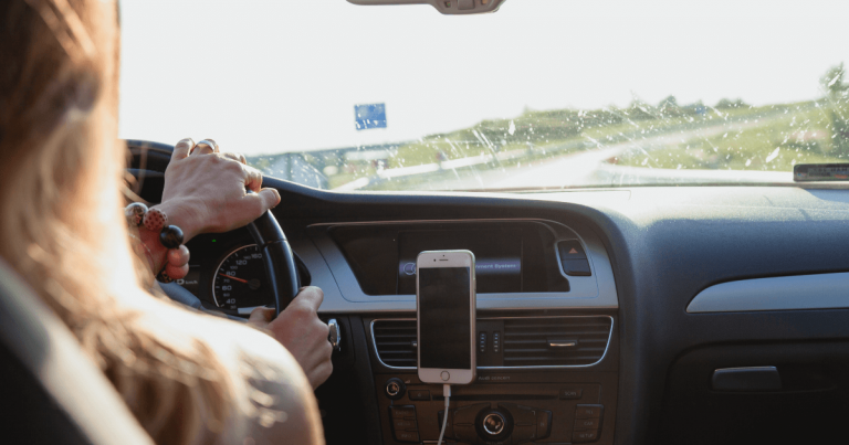 A woman driving a car